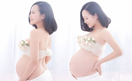 生女孩的孕肚照片